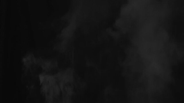 Hot food steam, water vapor in black background, water vapor floating in the air, water vapor smoke, white water steam in black background