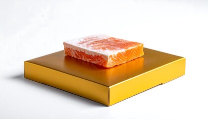 Fresh salmon fillet on a golden box, ideal for healthy culinary presentations