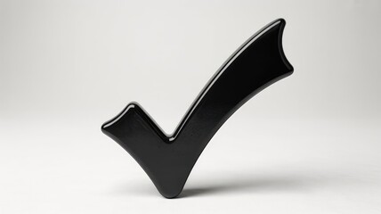 A sleek and glossy three-dimensional black checkmark symbol stands prominently against a clean, bright white background, signifying completion or approval.