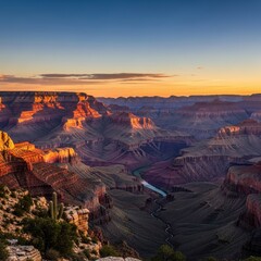 Majestic grand canyon landscape at sunset, golden sunlight illuminates layered rock formations,