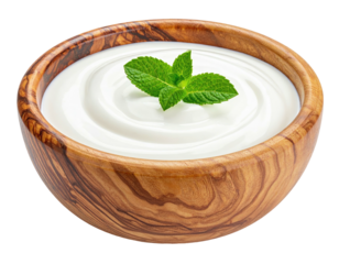 Creamy yogurt in a wood bowl, topped with a sprig of fresh mint