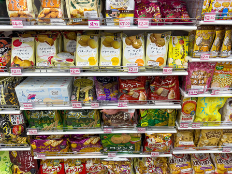 Japanese Snack Aisle With Assorted Packaged Treats at Daiso.