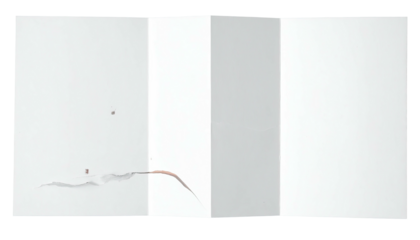 Fractured rectangular surface with varying shades of white and gray, some damage