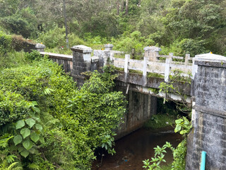 A highway bridge over a small stream en route to Valparai from Aliyar through the scenic western ghats in Coimbatore district.