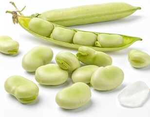 Fresh green fava beans, some shelled, on white. Pod open