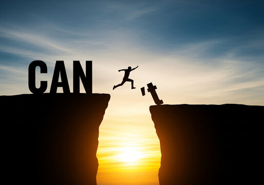 Silhouette man jumping over cliffs for I can do it , good mindset by never give up concept