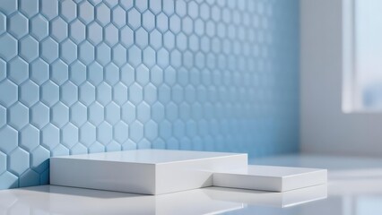 Minimalist white platform display against hexagonal blue tiled wall in a bright indoor setting