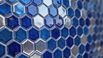 Close-up of blue hexagonal mosaic tiles with reflective surfaces
