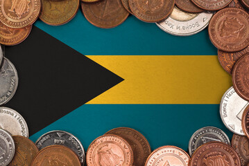 Coins on flag of Bahamas trading investment business currency concept
