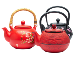 Three colorful teapots with varying styles and handle designs on a black background