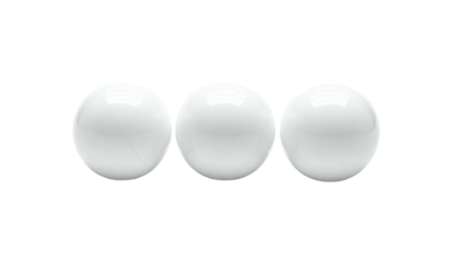 Three white spheres arranged horizontally against a stark black backdrop