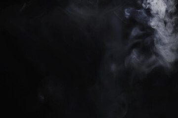 White clouds of vapor smoke are isolated on a black background. overlay