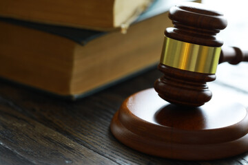 Obraz premium Judges gavel on wooden desk. Law firm concept.