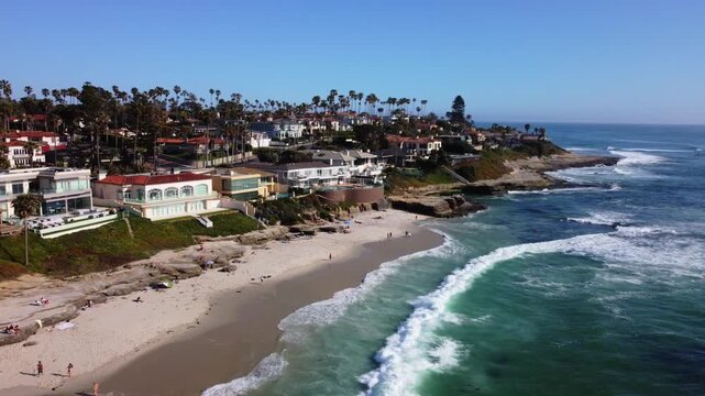 Windansea, La Jolla Beach, San Diego. Drone View of Residential Neighborhood along Coastal Tidal Waters on Clear Sunny Day. Luxury Ocean Beachfront Real Estate.