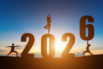 Happy New Year Numbers 2026, Silhouette woman practicing yoga early morning sunrise over the horizon background, Health and Happy new year concept.