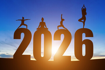 Happy New Year Numbers 2026, Silhouette woman practicing yoga early morning sunrise over the horizon background, Health and Happy new year concept.