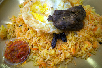 Nasi briyani, Lamb Madghout biryai rice, a popular Arabian rice dish, rice and meat (chicken or lamb)