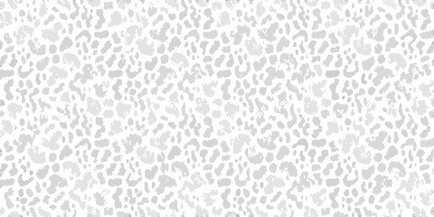 Subtle gray and white leopard print pattern with organic irregular shapes © Dibyendu