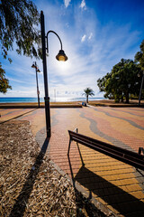 Sunset Stroll on Patterned Boardwalk