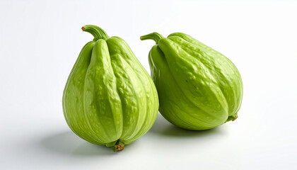 Naklejka premium Two Pear- Shaped Green Chayote Squashes with Stems on White Background vegetable fresh