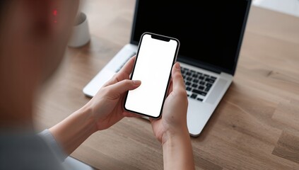 Close up of smartphone with empty screen in office setting representing app presentation and modern technology use