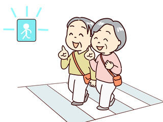 元気に出かける高齢者、横断歩道を青信号のうちに渡る