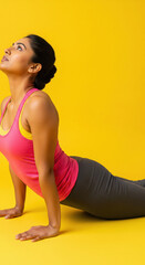 Fit Indian Woman Practicing Cobra Yoga Pose for Wellness