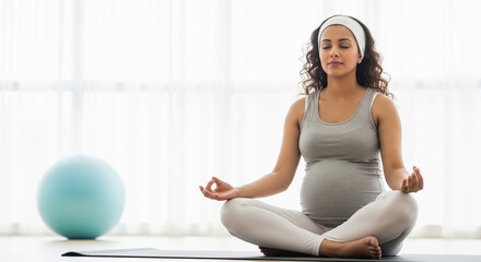 Serene pregnant woman practices yoga and meditation for prenatal wellness.