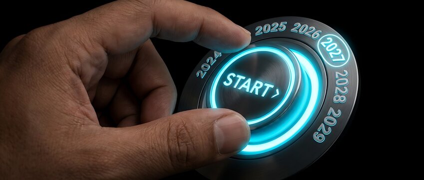 A hand is poised to activate a futuristic control dial displaying years from 2024 to 2029 with start illuminated - Powered by Adobe