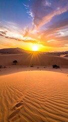 Radiant sun bursts over rippled sand dunes, creating a warm, golden, and serene desert landscape under a colorful sky