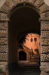 Stone arch in the old italian towns. Sicily, Italy