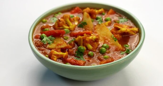 aloo gobhi Mix Vegetable greavy recipe in a bowl, Indian restaurant style veg recipe served with Chapati