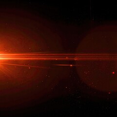Vibrant orange lens flare against dark background with faint particles