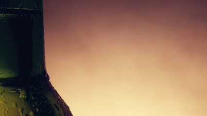 Bottle of cold beer with condensation and water drops