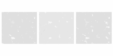 Three gray panels featuring scattered white speckles against a light backdrop