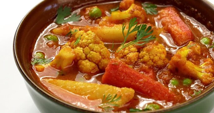 aloo gobhi Mix Vegetable greavy recipe in a bowl, Indian restaurant style veg recipe served with Chapati