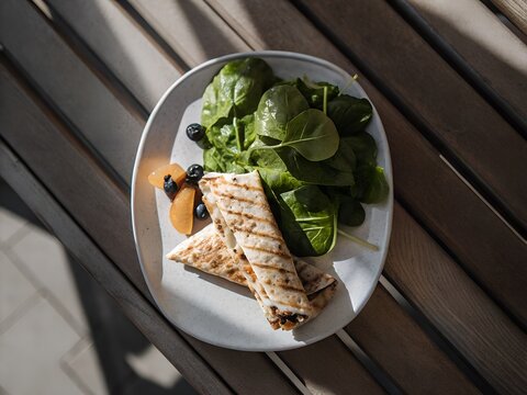 Grilled chicken salad with fresh leafy greens