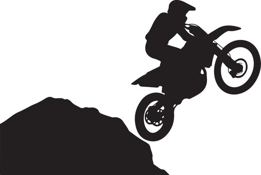 Black silhouette of a motocross rider jumping a dirt bike