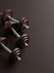 Dark brown dumbbells resting on a dark  background. Space for text. New Year goals, resolution, fitness, bodybuilding, healthy lifestyle challenge, overweight concept.