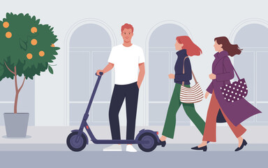 This image features a young man on a scooter, casually standing with two women walking nearby, highlighting themes of urban mobility, friendship, and modern lifestyle. © Jinliu