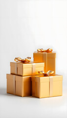 Naklejka premium Stack of yellow gift boxes with bows on white background 