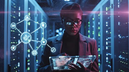 Woman engineer uses holographic tablet with network diagram in data center server room. Female specialist interacts with hologram network visualization and tablet. Professional examines holographic ne - Powered by Adobe
