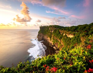 Scenic coastal cliff at sunset, overlooking a vast ocean
