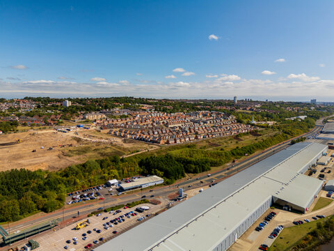 Newcastle upon Tyne UK: 15th Aug 2025: Scotswood Road Vickers Armstrong industrial plant with Elswick new housing estate shwoing regeneration in the north east