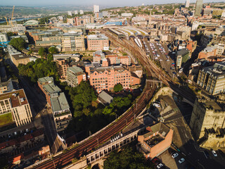 Newcastle upon Tyne: 17th Aug 2025: Drone view showcasing Newcastle Central Station. The bustling city landscape features historic architecture, sunny morning