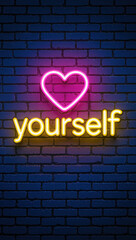 Obraz premium Neon sign brightly displays a pink heart and yellow lettering that says love yourself against a dark brick wall background, providing a vibrant contrast and uplifting message.
