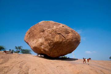 Krishnas butterball, Balancing giant natural rock stone, Mahabalipuram, Tamil Nadu, India