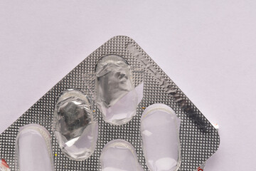 Empty pill packaging prepared for recycling
