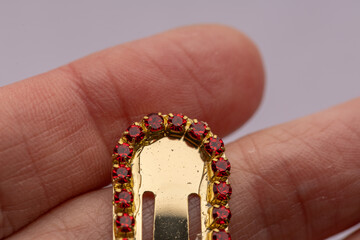 Red crystal rhinestones for decoration on a gold background