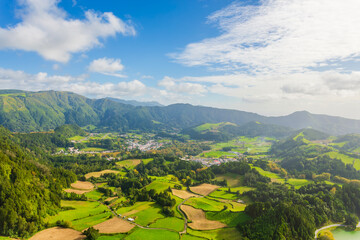 Aerial panoramic view of Furnas Valley volcanic crater and village, Sao Miguel, Azores